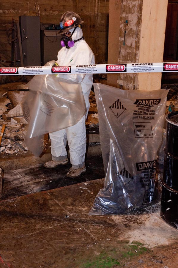 Asbestos removal operative wearing RPE